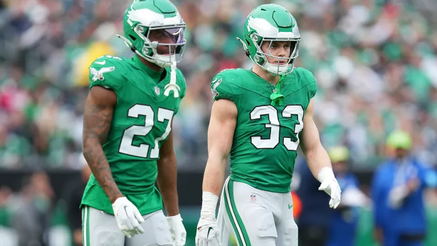 PHILADELPHIA, PENNSYLVANIA – DECEMBER 29: Quinyon Mitchell #27 and Cooper DeJean #33 of the Philadelphia Eagles look on against the Dallas Cowboys at Lincoln Financial Field on December 29, 2024 in Philadelphia, Pennsylvania. (Photo by Mitchell Leff/Getty Images)