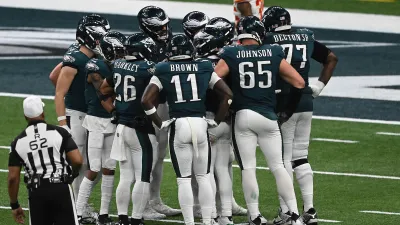 NEW ORLEANS, LOUISIANA – FEBRUARY 09: The Philadelphia Eagles offense huddles against the Kansas City Chiefs in the third quarter during Super Bowl LIX at Caesars Superdome on February 09, 2025 in New Orleans, Louisiana. (Photo by Focus on Sport/Getty Images) *** Local Caption ***