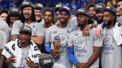 Thunder players celebrate winning the Western Conference Finals