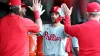Phillies lose shutout in 9th but hang on to close out 8th straight win