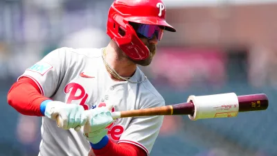 May 22, 2025; Denver, Colorado, USA; Philadelphia Phillies first baseman Bryce Harper (3) on deck to bat during the first inning against the Colorado Rockies at Coors Field. Mandatory Credit: Ron Chenoy-Imagn Images