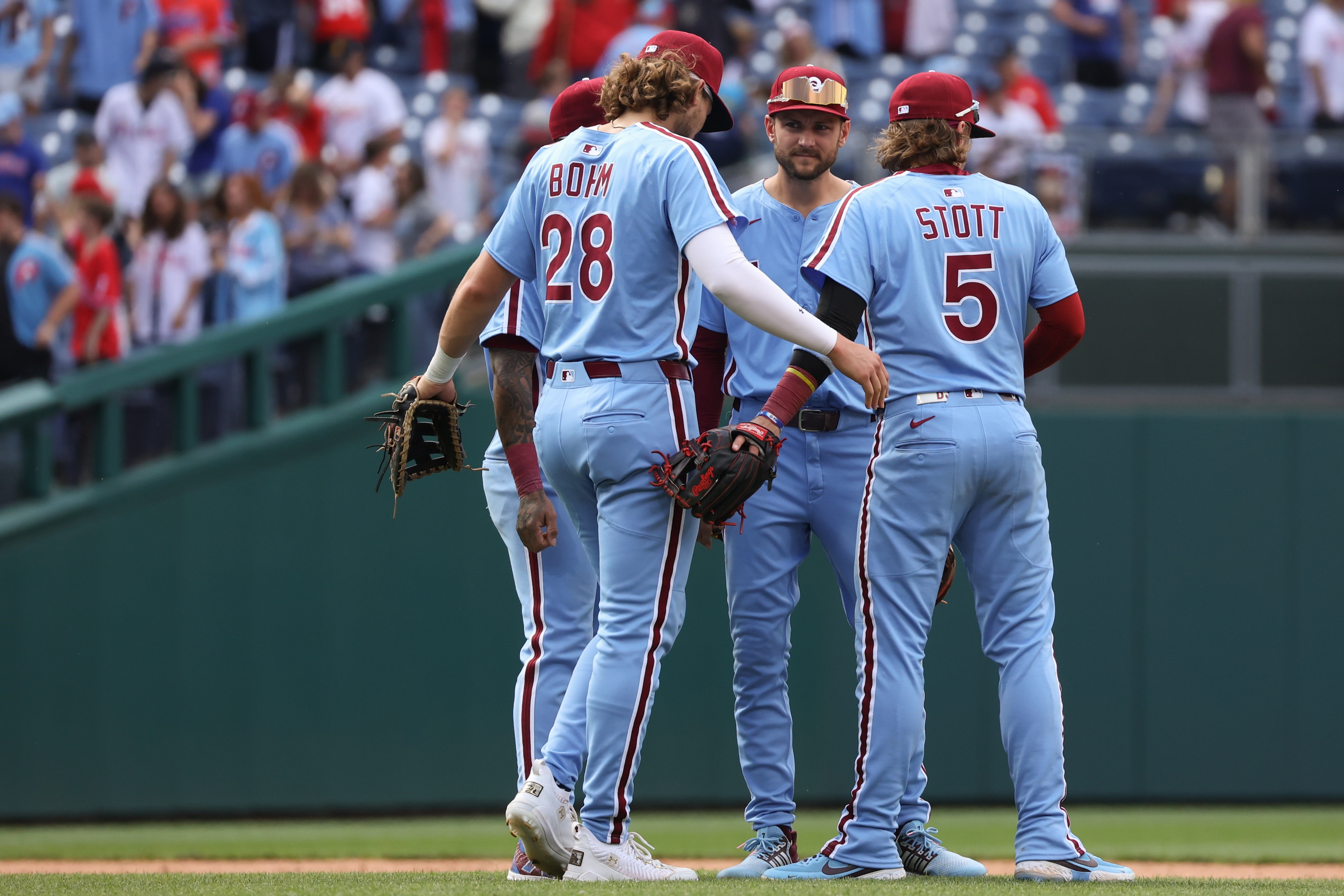 PHILADELPHIA, PA – MAY 29:   Alec Bohm #28, Edmundo Sosa #33, Trea Turner #7 and Bryson Stott #5 of the Philadelphia Phillies celebrate after winning the game between the Atlanta Braves and the Philadelphia Phillies at Citizens Bank Park on Thursday, May 29, 2025 in Philadelphia, Pennsylvania. (Photo by Abdoul Sow/MLB Photos via Getty Images)