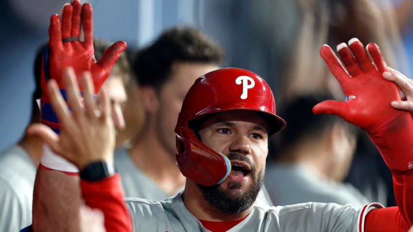 Kyle Schwarber of the Philadelphia Phillies while wearing the #21 in honor of Roberto Clemente, celebrates a home run against the Los Angeles Dodgers in the first inning at Dodger Stadium on September 15, 2025 in Los Angeles, California.