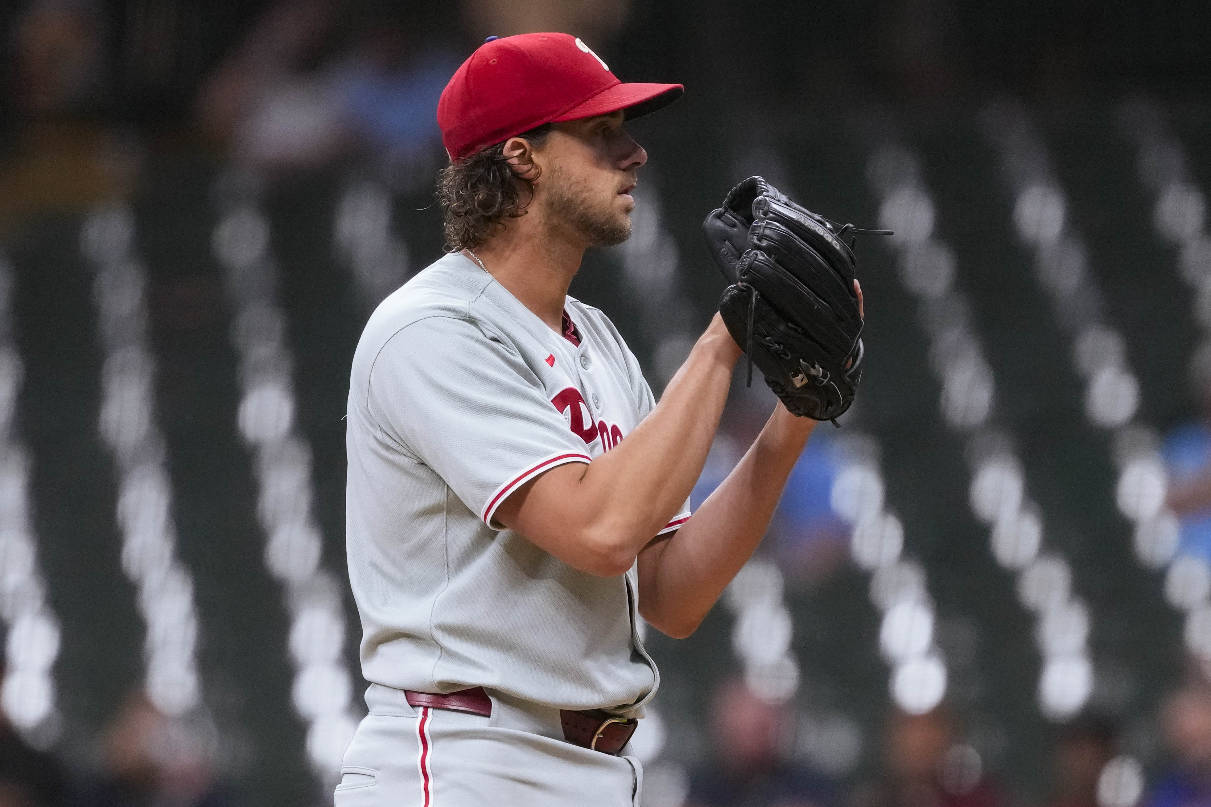 Sep 3, 2025; Milwaukee, Wisconsin, USA;  Philadelphia Phillies pitcher Aaron Nola (27) prepares to throw a pitch during the first inning against the Milwaukee Brewers at American Family Field. Mandatory Credit: Jeff Hanisch-Imagn Images