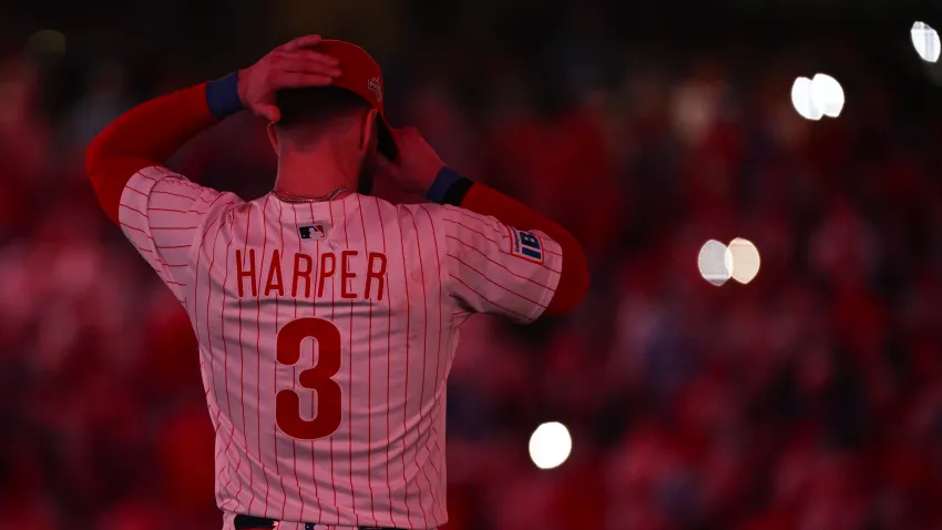 Oct 6, 2025; Philadelphia, Pennsylvania, USA; Philadelphia Phillies first baseman Bryce Harper (3) looks on at the start of the ninth inning during game two of the NLDS round against the Los Angeles Dodgers for the 2025 MLB playoffs at Citizens Bank Park. Mandatory Credit: Eric Hartline-Imagn Images