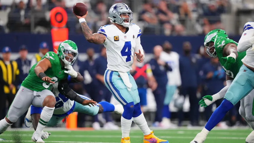 Dallas Cowboys quarterback Dak Prescott (4) throws a pass during the first half of an NFL football game against the Philadelphia Eagles, Sunday, Nov. 23, 2025, in Arlington, Texas.