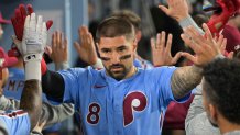 Oct 8, 2025; Los Angeles, California, USA; Philadelphia Phillies right fielder Nick Castellanos (8) celebrates after scoring a run during the eighth inning against the Los Angeles Dodgers during game three of the NLDS round for the 2025 MLB playoffs at Dodger Stadium. Mandatory Credit: Jayne Kamin-Oncea-Imagn Images
