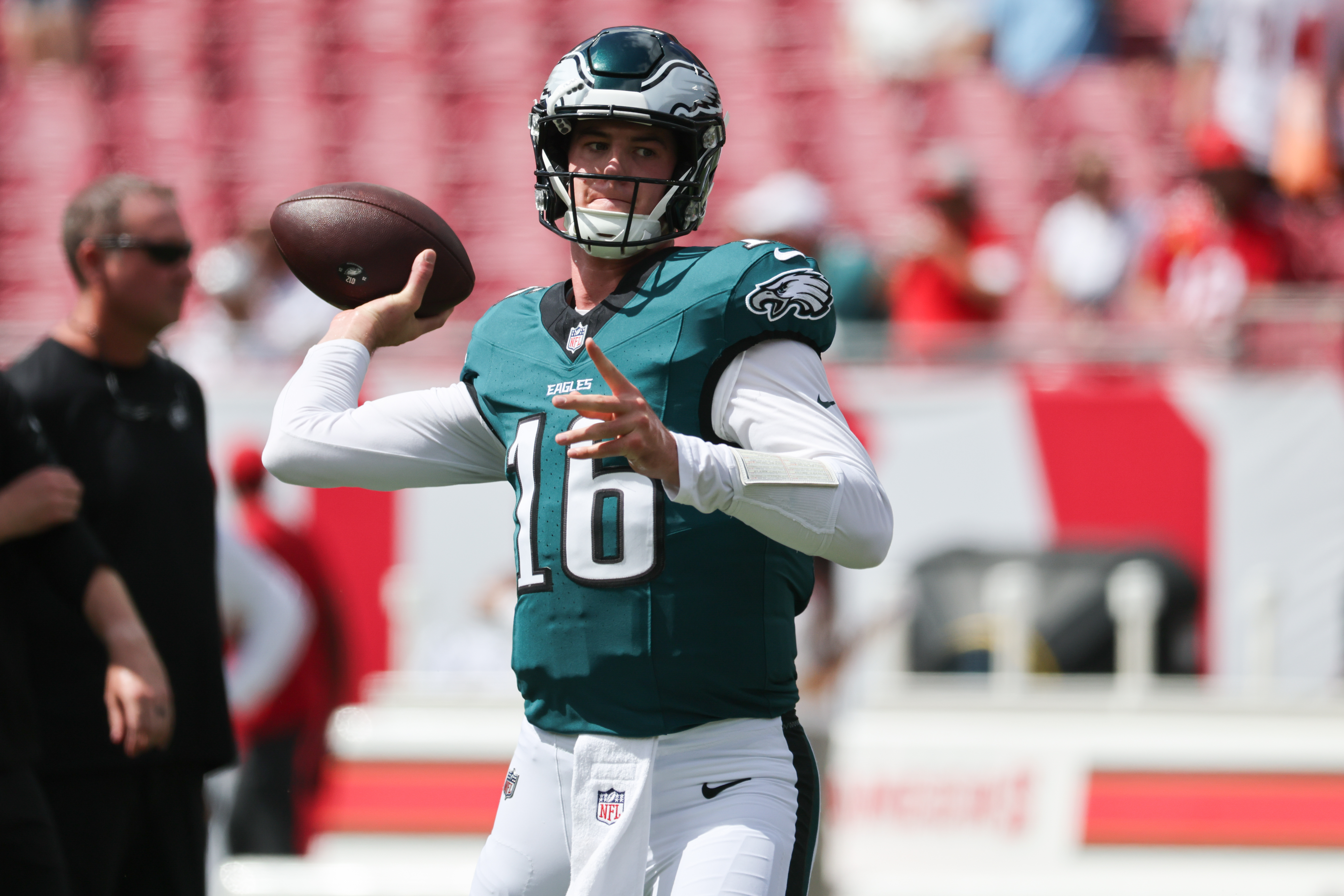 Sep 28, 2025; Tampa, Florida, USA; Philadelphia Eagles quarterback Tanner McKee (16) warms up before the game against the Tampa Bay Buccaneers at Raymond James Stadium. Mandatory Credit: Kim Klement Neitzel-Imagn Images