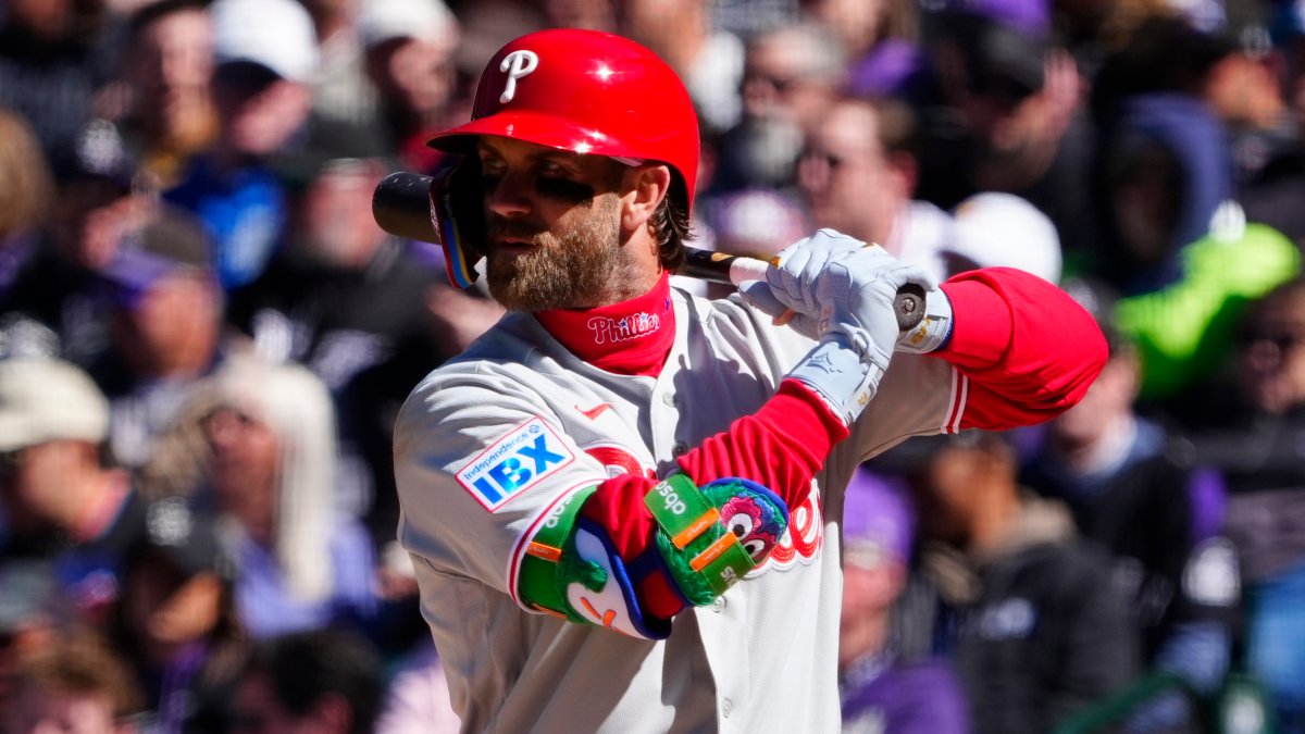 Unfazed Phillies get right, bats erupt in rout of Rockies