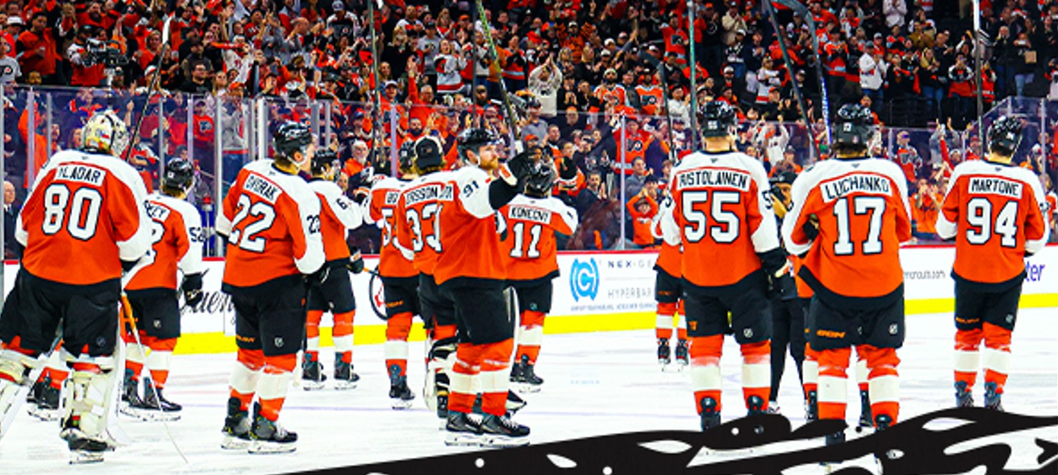 The Philadelphia Flyers gather on the ice as the crowd gives the team a standing ovation following Saturday's loss.