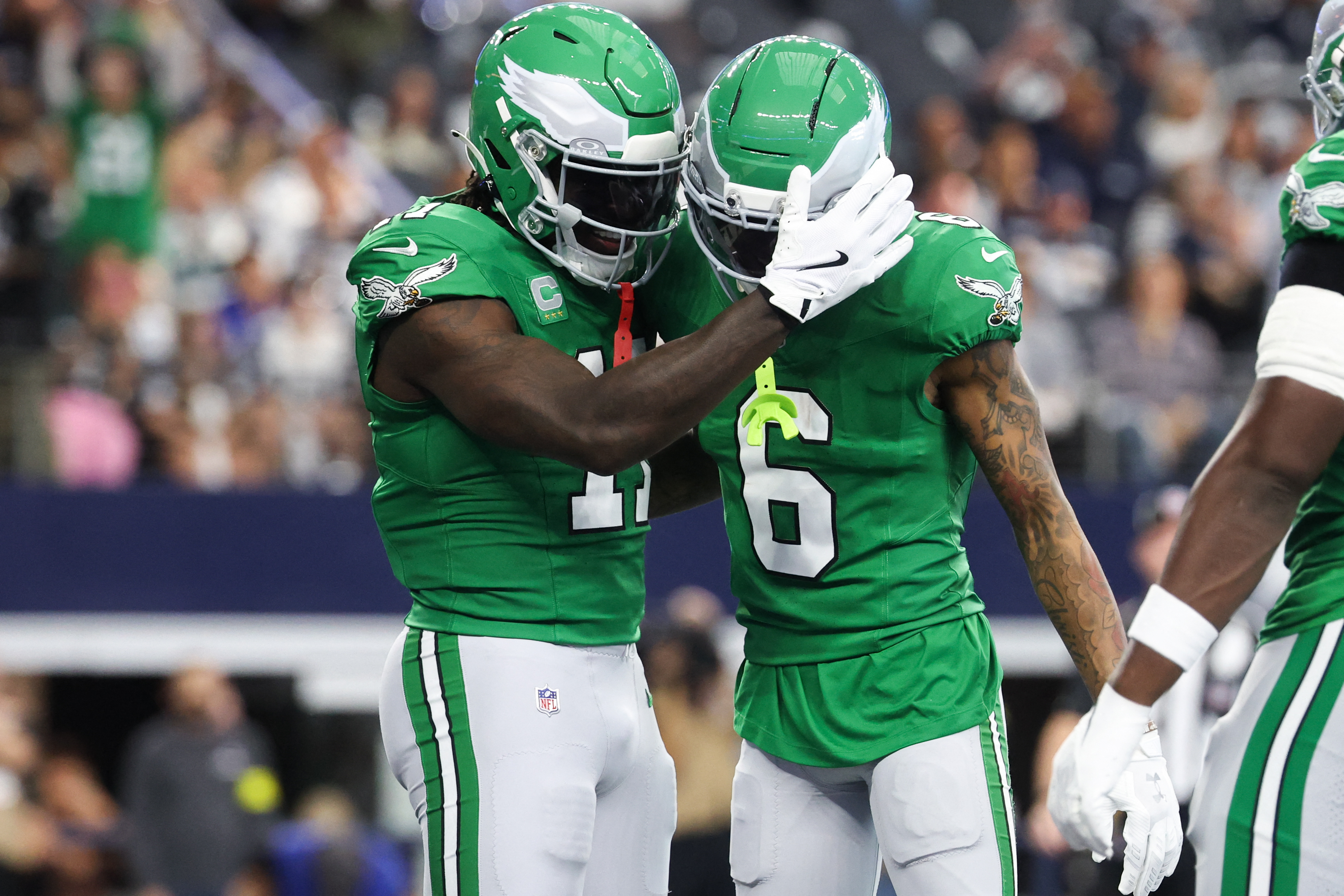 Nov 23, 2025; Arlington, Texas, USA; Philadelphia Eagles wide receiver AJ. Brown (11) celebrates a touchdown with wide receiver Devonta Smith (6) in the first quarter against the Dallas Cowboys at AT&T Stadium. Mandatory Credit: Kevin Jairaj-Imagn Images
