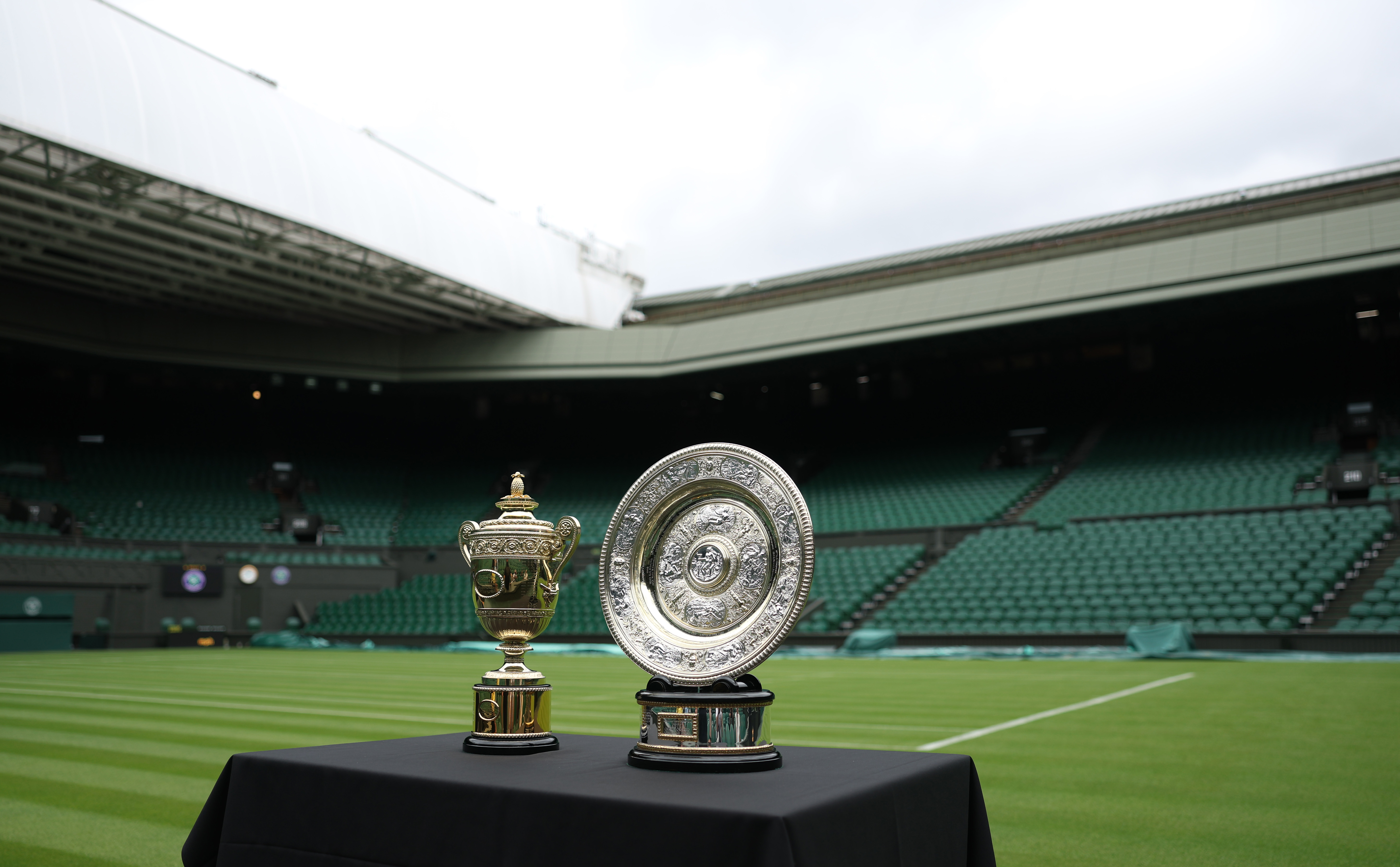 A general view of the Gentlemen’s Singles Trophy, The Cup and Ladies’ Singles Trophy, the The Venus Rosewater Dish, prior to The Championships Wimbledon 2025 at All England Lawn Tennis and Croquet Club on June 28, 2025, in London, England.