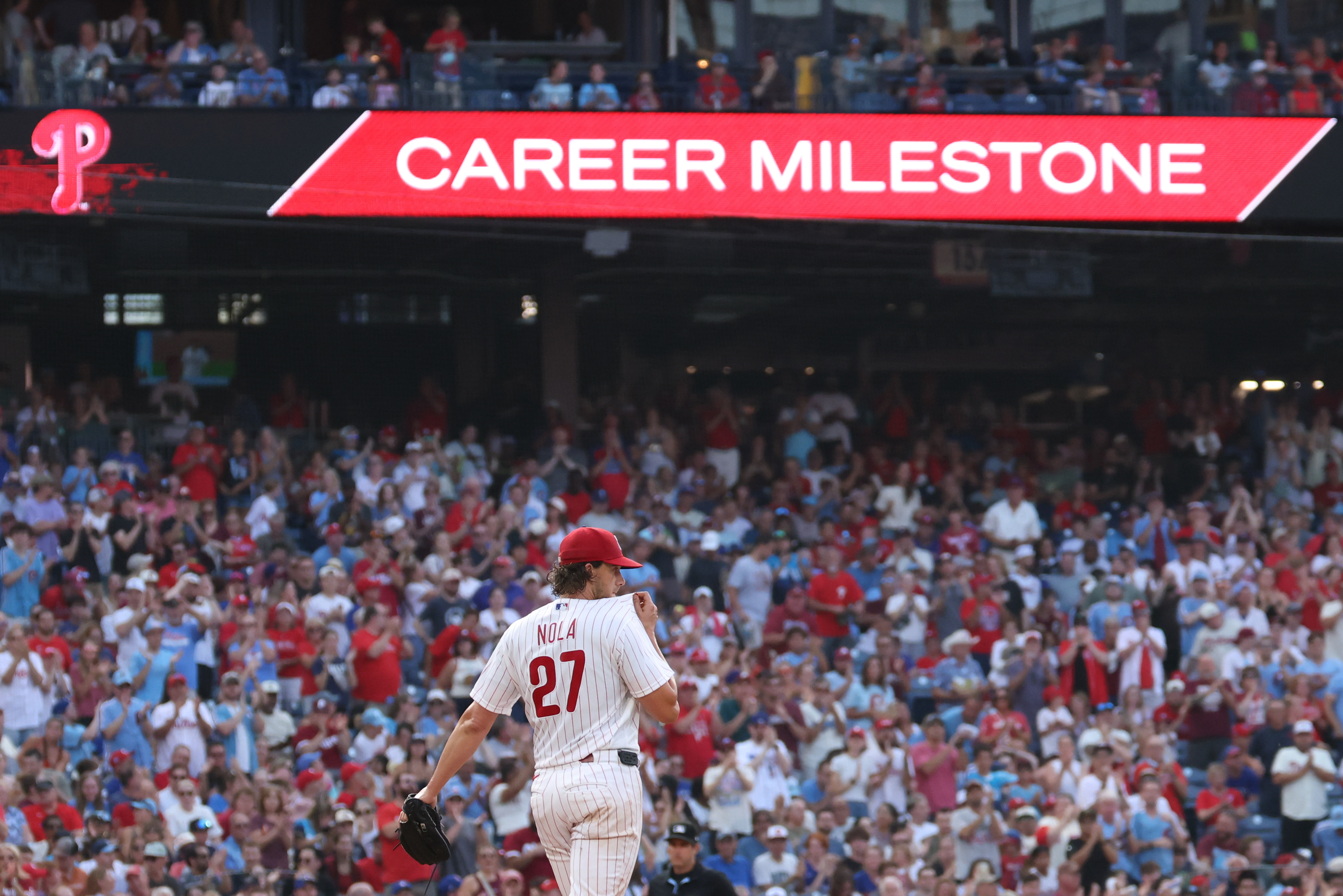 Nola joins rare Phillies company, but bullpen lets milestone night slip away