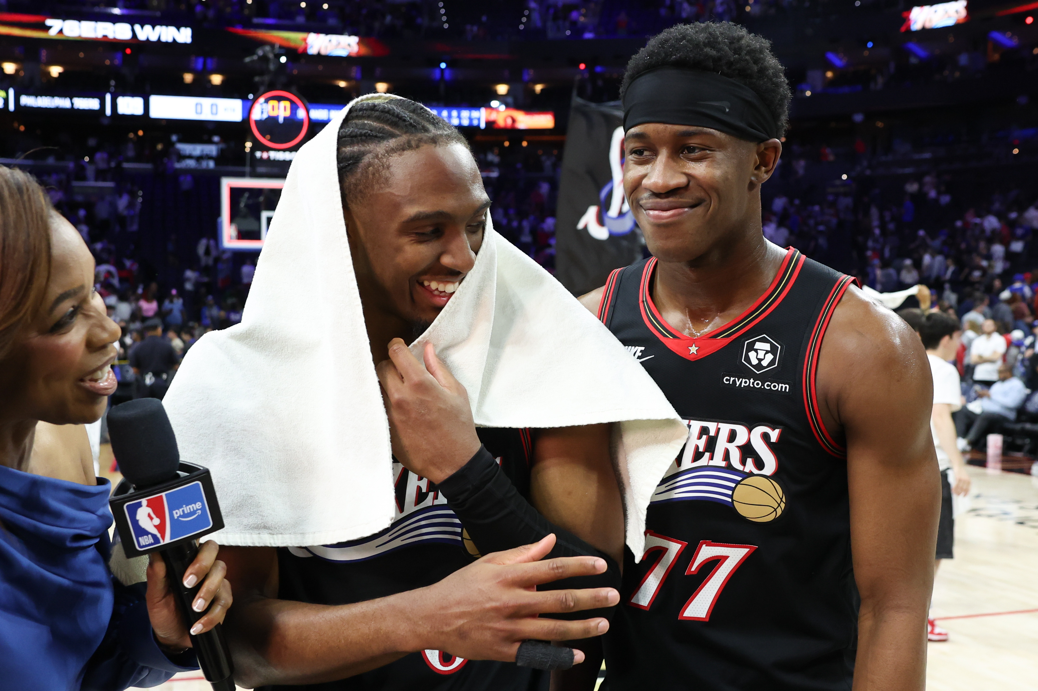 Apr 15, 2026; Philadelphia, Pennsylvania, USA; Philadelphia 76ers guard Tyrese Maxey (0) celebrates with guard Vj Edgecombe (77) after a win against the Orlando Magic in a play-in round of the 2026 NBA Playoffs at Xfinity Mobile Arena. Mandatory Credit: Bill Streicher-Imagn Images