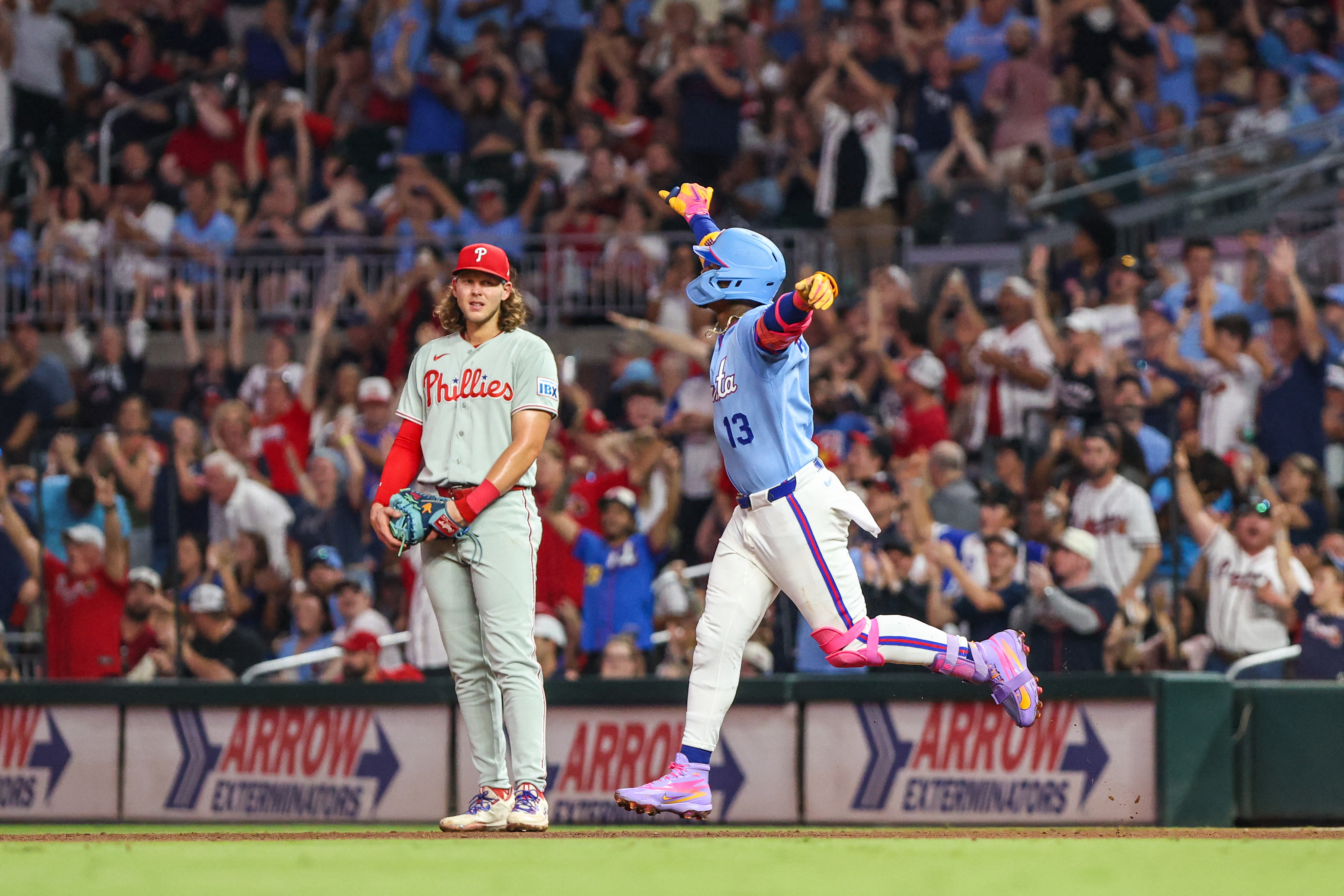 Sep 12, 2026; Cumberland, Georgia, USA;  Atlanta Braves right fielder Ronald Acuna Jr. (13) celebrates hitting a home run against the Philadelphia Phillies during the fourth inning at Truist Park.  Mandatory Credit: Jordan Godfree-Imagn Images