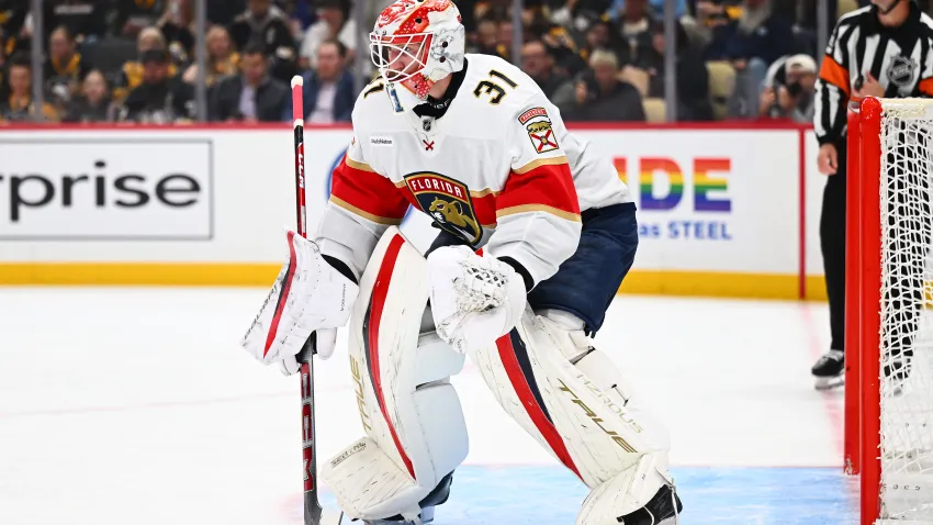 Cooper Black #31 of the Florida Panthers defends the net during his NHL debut.